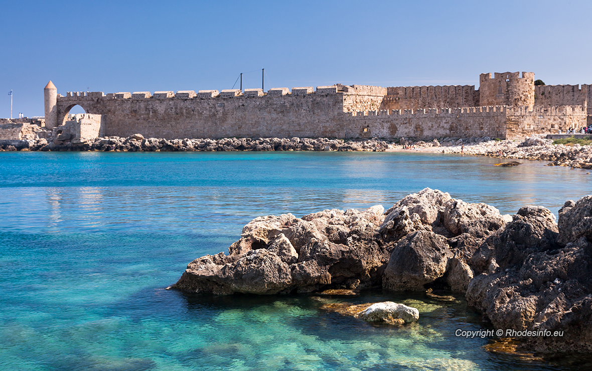 Walls of the old town taken from Mandraki Harbour Rhodes Greece